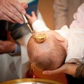 Il vescovo Cornacchia ha battezzato il piccolo Felice Gustamacchia